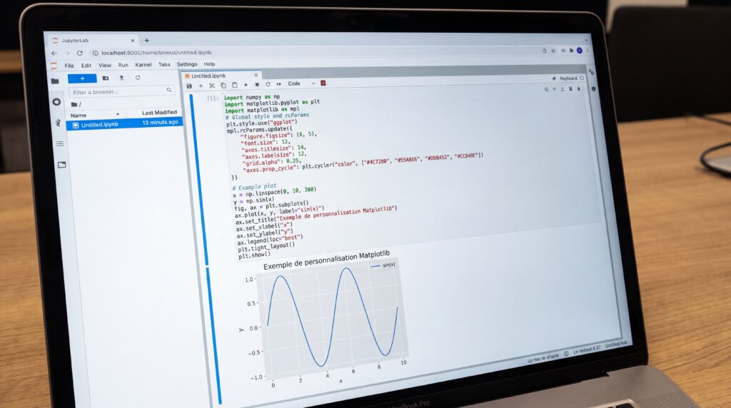 Écran d'ordinateur affichant du code Python et un graphique généré avec Matplotlib.