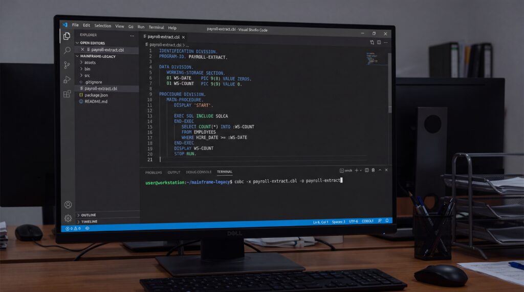 Écran d'ordinateur affichant du code COBOL dans un environnement de développement intégré.