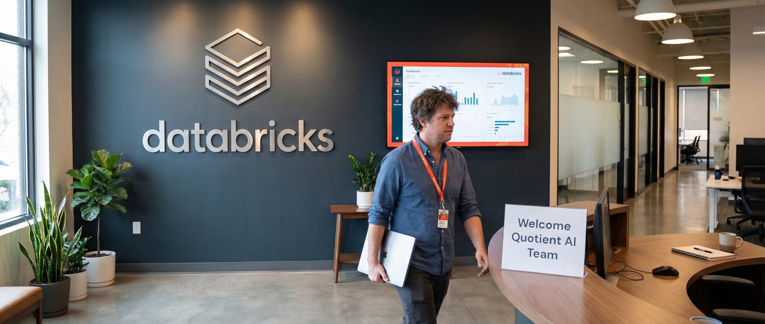 Empleado caminando por la oficina de Databricks con un cartel de bienvenida para visitantes de Quotient AI.